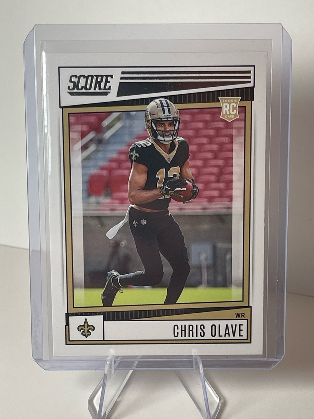 Score Chris Olave Rookie Football Card - Black & Gold